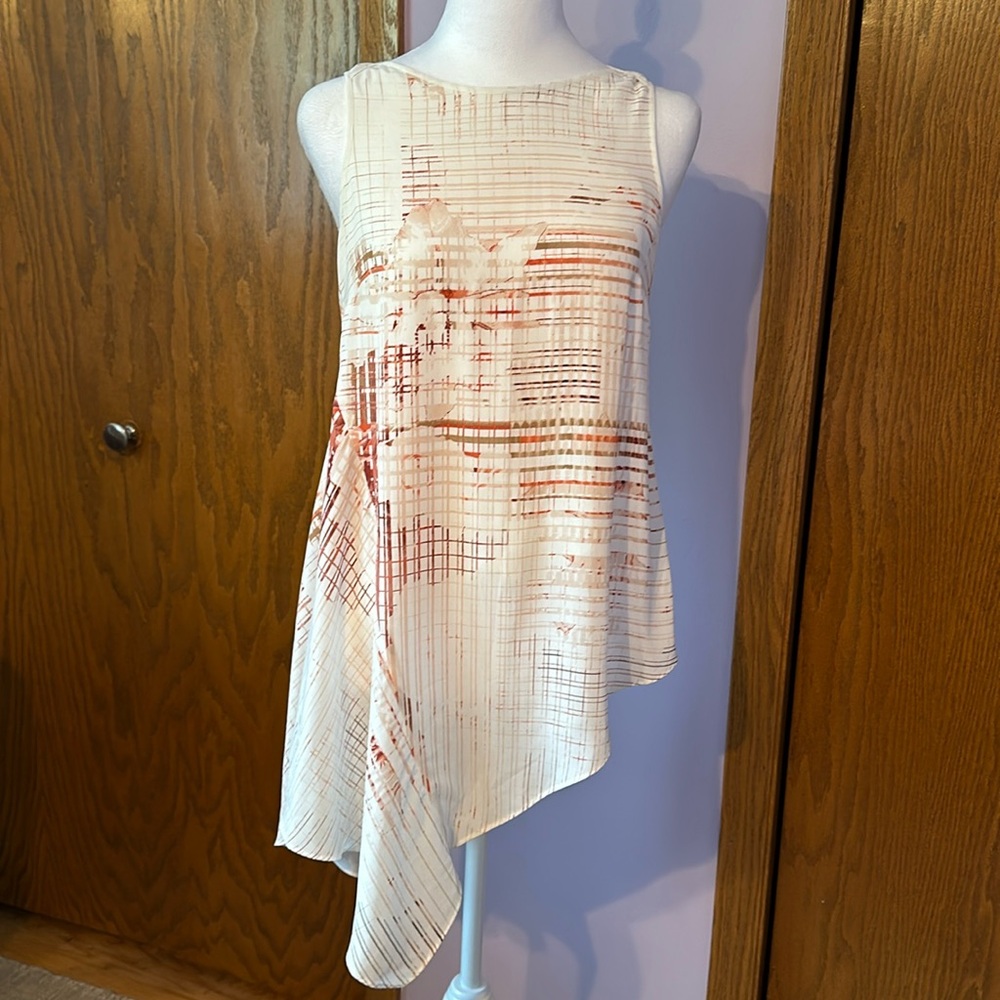 White House Black Market size extra small asymmetrical top.